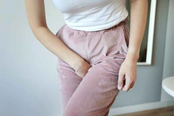 woman struggling with urine incontinence Greenock 