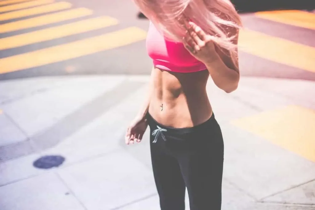 Woman with toned stomach after LA-EMS Body Sculpting Treatment Greenock